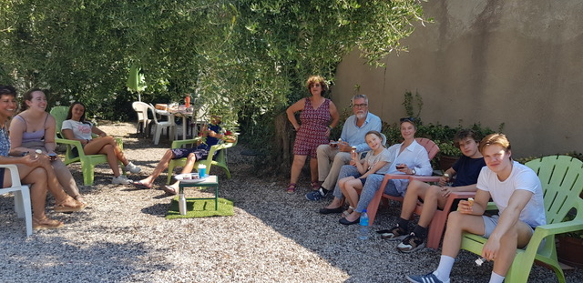 Teachers and students having a break in the garden